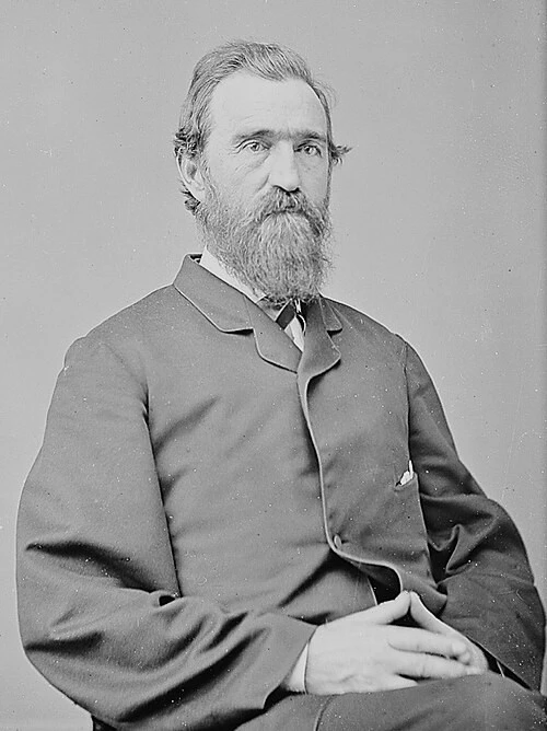 Black and white portrait of Gov. Thomas E. Bramlette in dark coat, white shirt, and dark bowtie.