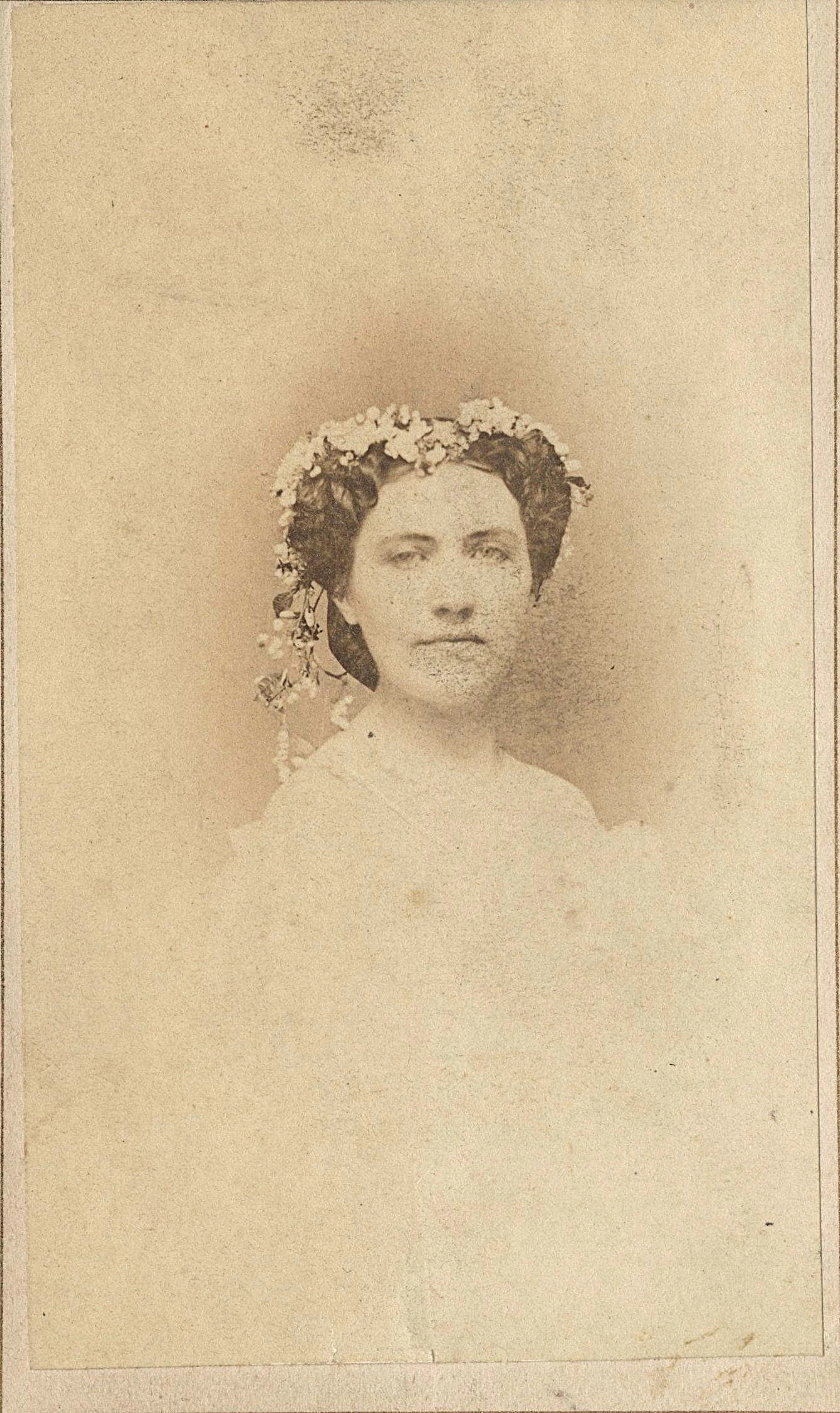 Black and white albumen portrait of Ellen Wingate Sawyier in her wedding gown around 1861